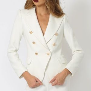 white jacket with gold buttons